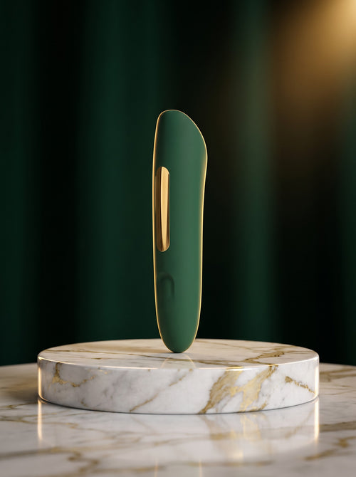 The IDG Bullet mini vibrator in IDG green with gold trim